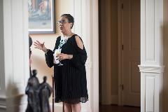 Women speaking at a event